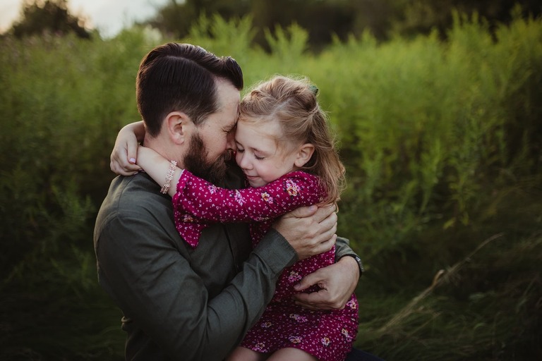 Dad and daughter snuggle hug bowmanville