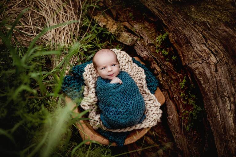 newborn in bowl in whitby woods