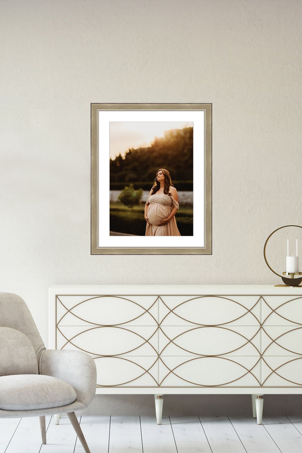 Stunning framed maternity photo on the wall of a modern office.